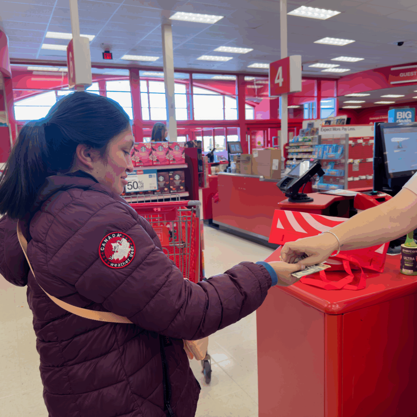tn-student-paying-at-target Meliora Academy Transition Program Student at Target with Cashier
