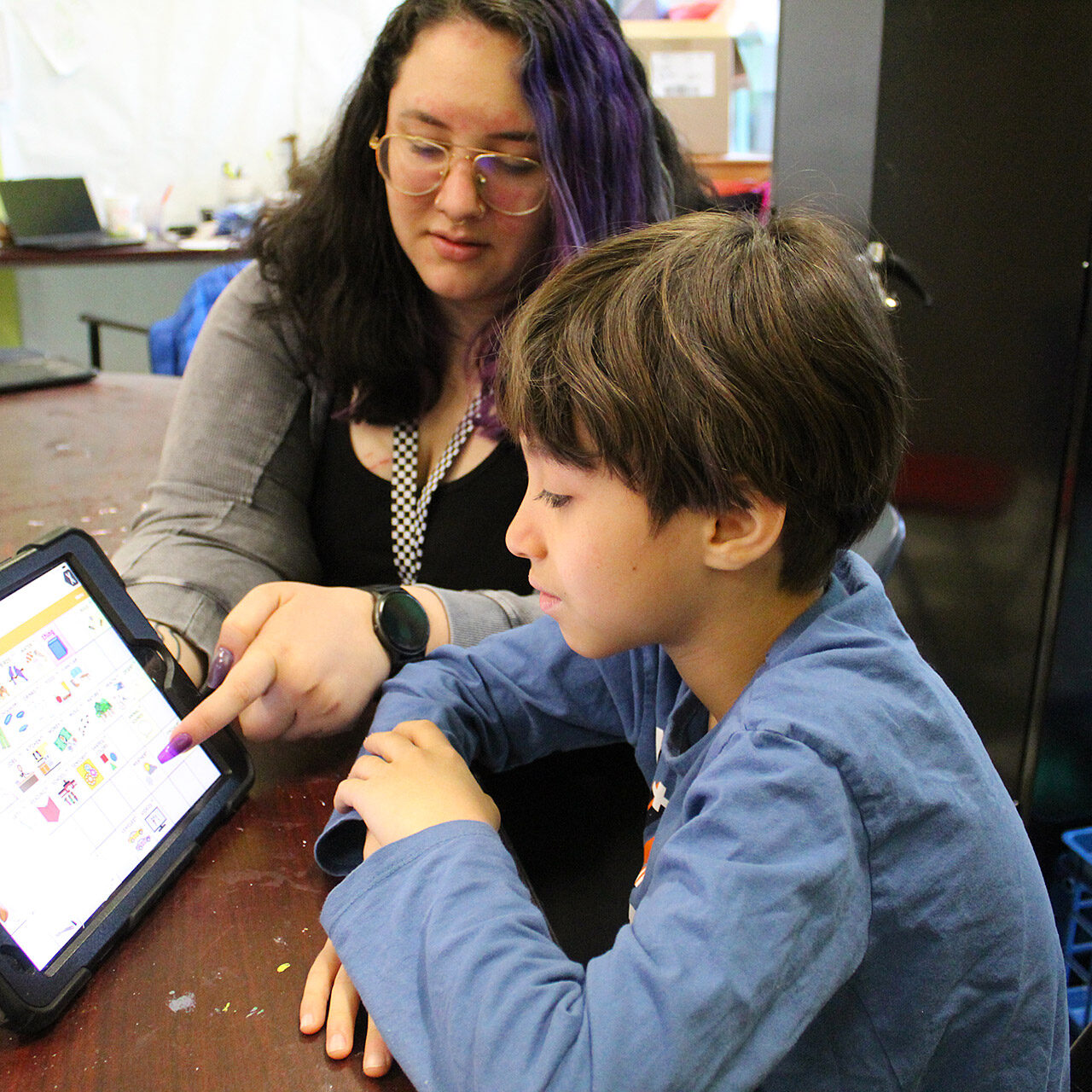 bg-assistive-device Teacher and Student with Assistive Device